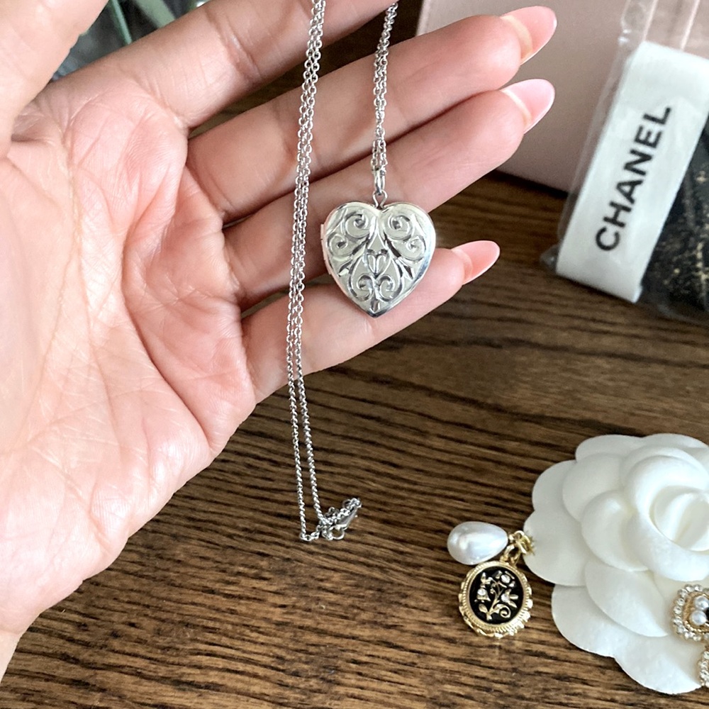 Silver hart locket from blue Nile.